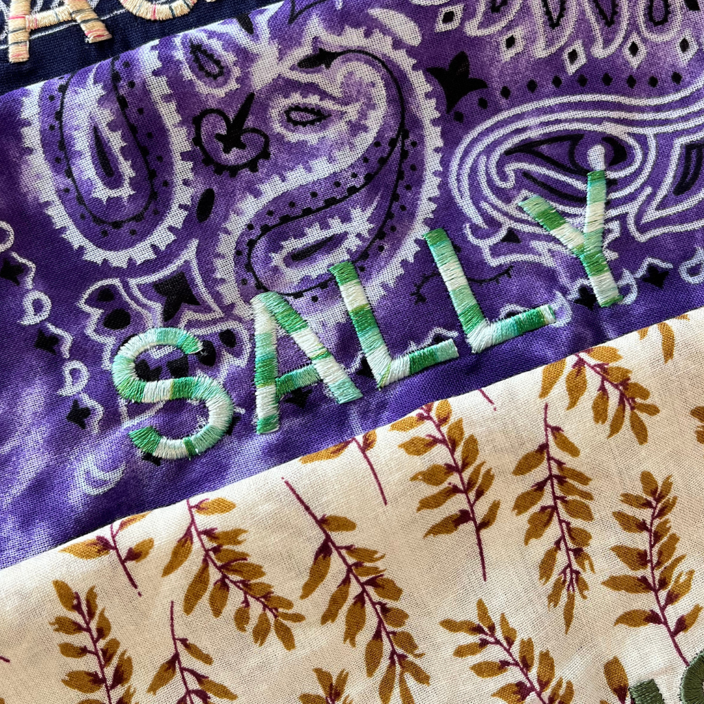 Let's personalize! Tye die purple bandana with ombre green letters
