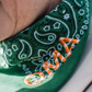 Let's personalize! Green bandana with orange yarn